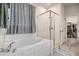 Bathroom featuring a soaking tub, a separate shower, and a walk-in closet at 11938 Bahia Valley Dr, Riverview, FL 33579