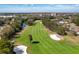 Enjoy beautiful golf course views at this property featuring green fairways and mature trees at 129 W Cypress Ct, Oldsmar, FL 34677