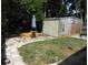 View of a backyard featuring a shed, lawn, patio, and various trees at 1372 S Hillcrest Ave, Clearwater, FL 33756