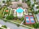 Aerial view of the community center featuring a pool and manicured landscaping at 14005 Kingfisher Glen Dr, Lithia, FL 33547