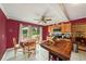 Cozy kitchen and dining area with an island and stainless steel microwave at 14803 Tulip Dr, Tampa, FL 33613