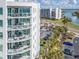 Luxury condo featuring spacious balconies with glass railings and outdoor seating for relaxing and enjoying the view at 1590 Gulf Blvd # 501, Clearwater Beach, FL 33767