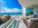 Wide balcony featuring ocean views, lounge chairs, and plenty of space for relaxation at 1590 Gulf Blvd # 501, Clearwater Beach, FL 33767