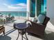 Relaxing balcony with comfortable seating and stunning views of the beach at 1590 Gulf Blvd # 501, Clearwater Beach, FL 33767