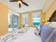 Bedroom with a view showing the large windows and custom bedding at 1590 Gulf Blvd # 501, Clearwater Beach, FL 33767