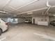 Large residential parking area with designated parking spots inside the building at 1590 Gulf Blvd # 501, Clearwater Beach, FL 33767