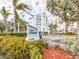 Well landscaped condo sign for Finale at 1590 with parking area at 1590 Gulf Blvd # 501, Clearwater Beach, FL 33767