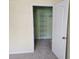 Open walk-in closet with metal shelving, maximizing storage and organizational options for the bedroom at 2755 Via Capri Dr # 1215, Clearwater, FL 33764