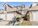 Charming townhome showcasing a well-kept lawn and front entryway at 2786 Countryside Blvd # 2, Clearwater, FL 33761