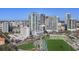 A scenic aerial view capturing downtown buildings, lush landscape, and an open stadium at 301 1St S St # 2104, St Petersburg, FL 33701