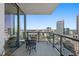 Relaxing balcony featuring city views, seating, and potted plants at 301 1St S St # 2104, St Petersburg, FL 33701