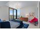 Bright bedroom with expansive views of the water and a modern, comfortable design at 301 1St S St # 2104, St Petersburg, FL 33701