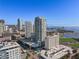 Aerial view of modern high-rise condos overlooking the bay and city skyline on a bright day at 301 1St S St # 2104, St Petersburg, FL 33701