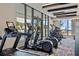 Well-equipped fitness center with treadmills, ellipticals, and large windows offering natural light at 301 1St S St # 2104, St Petersburg, FL 33701