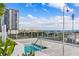 A modern rooftop hot tub boasts stunning city views from the building's sun deck at 301 1St S St # 2104, St Petersburg, FL 33701