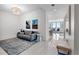 Bright living room with modern decor, beautiful floors and a gorgeous city view at 301 1St S St # 2104, St Petersburg, FL 33701