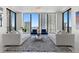 Bright living room showcasing floor-to-ceiling windows and comfortable seating at 301 1St S St # 2104, St Petersburg, FL 33701