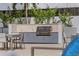 Outdoor kitchen with grill and dining area perfect for entertaining friends and Gathering at 301 1St S St # 2104, St Petersburg, FL 33701