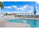 Relaxing rooftop pool with lounge chairs and views of the city and waterfront at 301 1St S St # 2104, St Petersburg, FL 33701