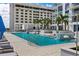 Resort-style pool with lounge chairs and outdoor shower, perfect for relaxing and enjoying the sunshine at 301 1St S St # 2104, St Petersburg, FL 33701