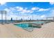 Stunning rooftop pool with lounge area overlooking the marina and beautiful blue sky at 301 1St S St # 2104, St Petersburg, FL 33701