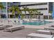 Inviting community pool featuring poolside lounge chairs and relaxing atmosphere at 301 1St S St # 2104, St Petersburg, FL 33701