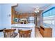 Cozy kitchen featuring laminate countertops, wood cabinets, and stainless steel appliances at 4529 Olive Dr, Zephyrhills, FL 33542