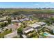 Overhead view showcasing a neighborhood with private, fenced yards, mature trees, and serene surroundings at 4706 Shale Pl, Tampa, FL 33615