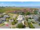 An aerial perspective of a residential area, highlighting manicured lawns and proximity to waterfront condos at 4706 Shale Pl, Tampa, FL 33615