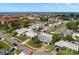 This aerial shot shows a well-maintained neighborhood with mature trees and a glimpse of the nearby water at 4706 Shale Pl, Tampa, FL 33615