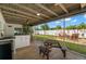 The covered and screened patio area provides seamless indoor-outdoor living and access to the backyard at 4706 Shale Pl, Tampa, FL 33615