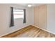 Cozy bedroom featuring hardwood floors, a ceiling fan and lots of natural light at 4710 23Rd S Ave, St Petersburg, FL 33711