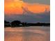 Scenic waterfront view with a colorful sunset over a calm body of water at 4900 59Th S Ave, St Petersburg, FL 33715