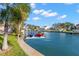 Waterfront canal view showcasing a private boat dock with a kayak lift, great for water enthusiasts at 4930 60Th S Ave, St Petersburg, FL 33715