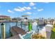 Canal view with boat lift, adjacent to a private dock offering easy access to waterways at 4930 60Th S Ave, St Petersburg, FL 33715