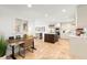 Bright kitchen with travertine tile flooring, modern cabinetry and stainless steel appliances at 4930 60Th S Ave, St Petersburg, FL 33715