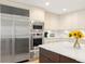 Close up of kitchen features stainless steel appliances and modern cabinets at 4930 60Th S Ave, St Petersburg, FL 33715