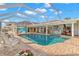 Relaxing pool area with mural enclosed within a screened lanai at 4930 60Th S Ave, St Petersburg, FL 33715