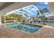 Sparkling pool enclosed in a screened lanai offering waterfront views at 4930 60Th S Ave, St Petersburg, FL 33715