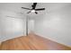 Spacious bedroom offers hardwood floors and a closet with folding doors at 5011 S Elberon St, Tampa, FL 33611