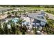 An aerial shot shows the inviting community pool area complete with covered cabanas and lounge chairs, perfect for relaxation at 5021 124Th E Ave, Parrish, FL 34219