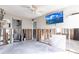 Bedroom featuring exposed wall studs and a television mounted on the wall at 522 Pine Ave # 6A, Anna Maria, FL 34216