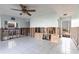 Bright and airy living room featuring tile floors and ample space at 522 Pine Ave # 6A, Anna Maria, FL 34216