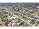 An aerial view of the home in relation to the surrounding neighborhood and the street at 5926 Bayou Grande Ne Blvd, St Petersburg, FL 33703