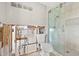 Bathroom with shower, tile floor, and a toilet, undergoing renovation at 5926 Bayou Grande Ne Blvd, St Petersburg, FL 33703