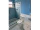 Bathroom featuring a blue tiled shower at 6188 Pinehurst Dr, Spring Hill, FL 34606