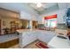 Bright kitchen offers a view into the dining room, creating an open and inviting space at 7078 Lexington Cir, Brooksville, FL 34602