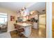 Functional eat-in kitchen features a breakfast bar and overlooks the dining area at 7078 Lexington Cir, Brooksville, FL 34602