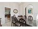 Open dining room features tile floors and seamless flow into other living spaces at 1001 Bayvista Dr, Tarpon Springs, FL 34689