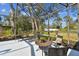 Relaxing screened patio area offers a peaceful outdoor retreat with comfortable seating at 1001 Bayvista Dr, Tarpon Springs, FL 34689